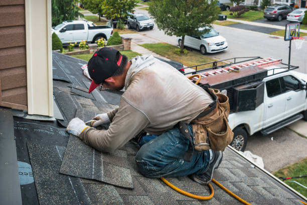 Professional Gutter Repair And Installation technician working in Wolcott, IN
